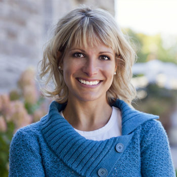 Smiling woman in a blue sweater