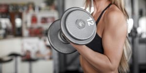 Woman lifting a dumbbell