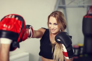 Woman practicing boxing