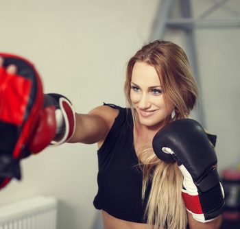 Woman practicing boxing