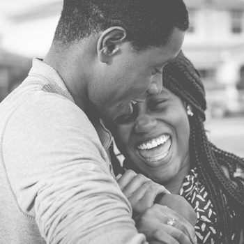 Couple hugging and smiling