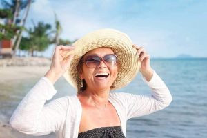 Woman smiling on a beach