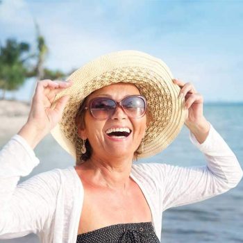 Woman smiling on a beach