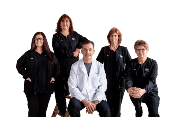 Photo of Dr. Del Kovacevic with staff